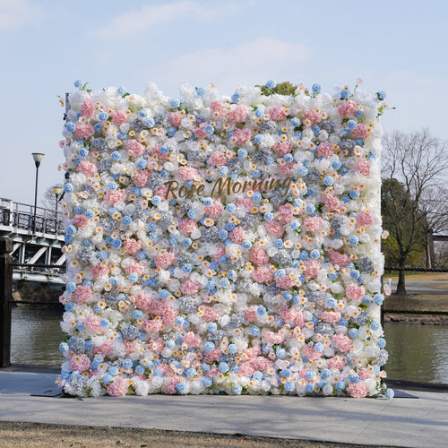 Rose Morning“The flower walls are made of artificial flowers in various colors, layered at different levels to create a lush, elegant and natural look. The exclusive zipper design and roll-up design make it easy to install and remove.”